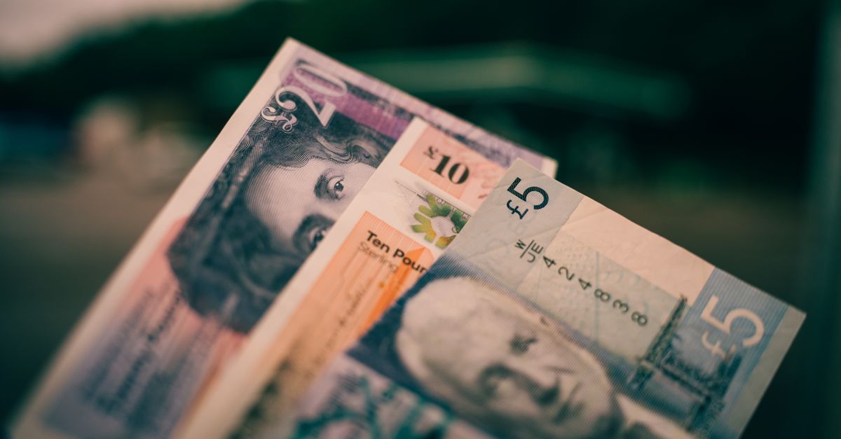 British sterling banknotes fanned out, representing a fixed, known price