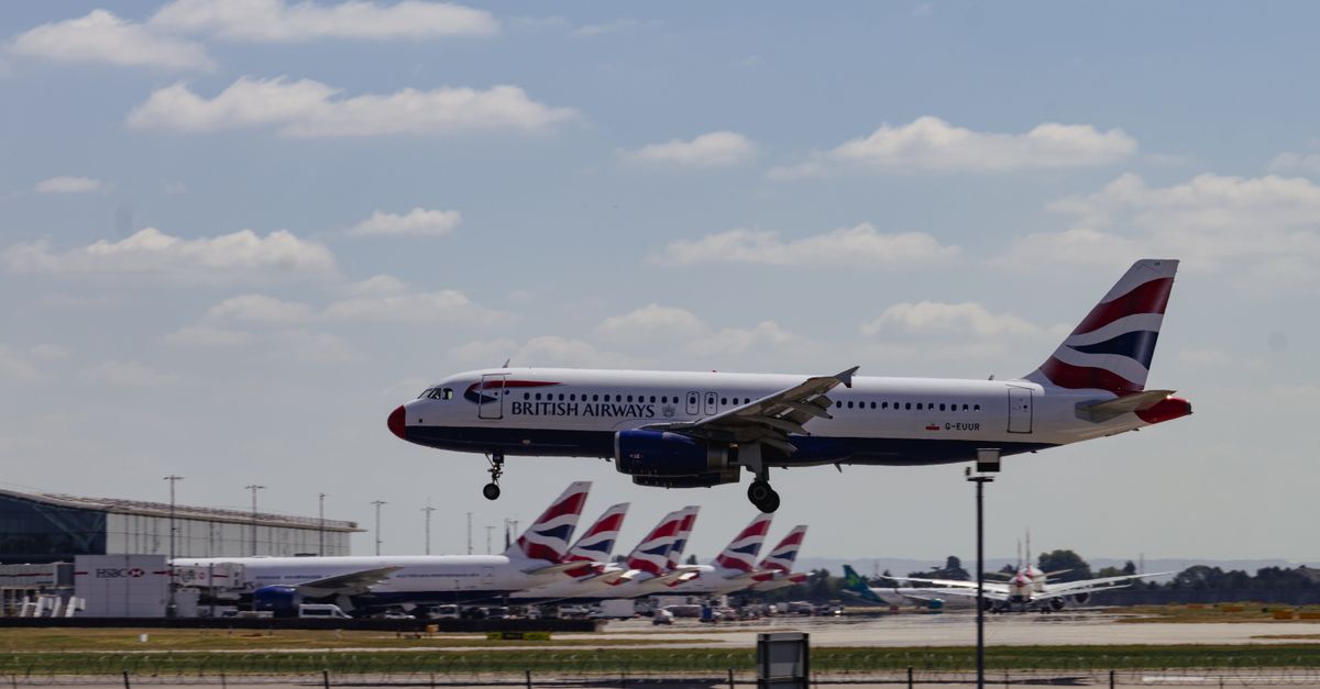 British Airways Airbus A320 landing at Heathrow, London on a clear day.